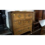 An old oak chest, of two short and two l