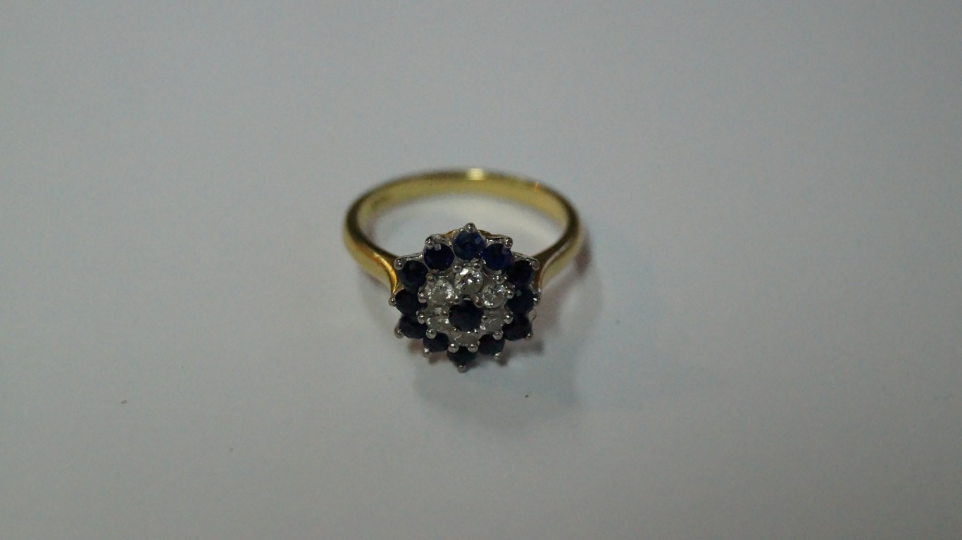 An 18ct gold diamond and sapphire floral