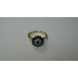 An 18ct gold diamond and sapphire floral