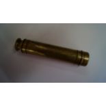 An antique brass three drawer telescope,