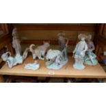 Five Lladro figures, to include a wheelb