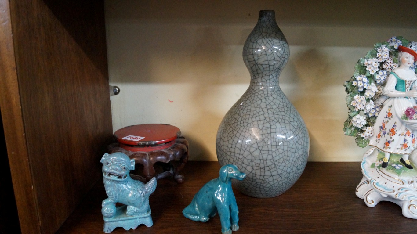 A Chinese crackle glaze double gourd vase, 29.5cm high; together with an unusual Chinese carved