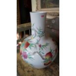 A large Chinese famille rose vase, probably Republic Period, painted with eight peaches, 53cm high.