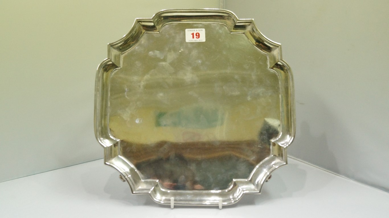 A silver salver, by Goldsmiths and Silve