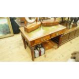 A late Victorian mahogany desk, with two