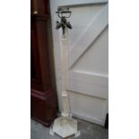 An Arts & Crafts white painted adjustabl