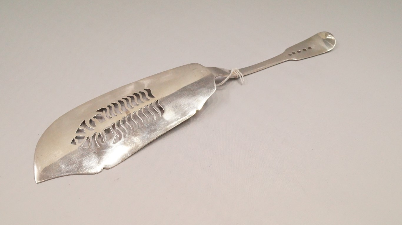 An Irish George IV silver fiddle pattern fish slice, by Thomas Farnett, Dublin 1827, with additional