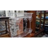 A 19th century white painted wirework pl