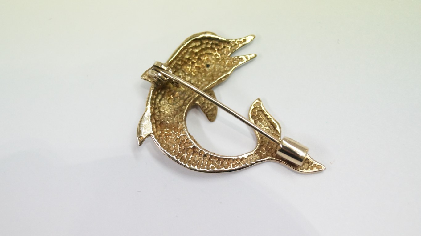 A 9ct gold dolphin brooch. - Image 2 of 2