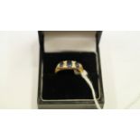 An 18ct diamond and sapphire ring, set t