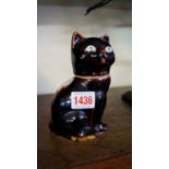 A treacle glazed cat form gin flask and