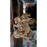 An antique carved ivory figural group of St George and Dragon, 12.5cm high. Condition Report: The