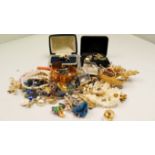 A quantity of mixed costume jewellery.