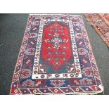 A modern bokhara style rug, 180 x 120cm