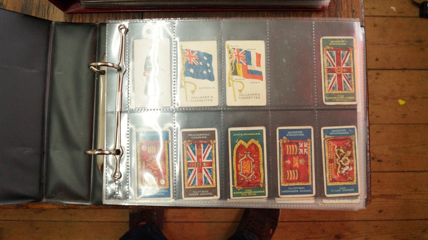 An album of 105 cigarette cards; and ass