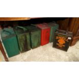 Four vintage Esso green tin cans; togeth