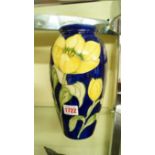 A Moorcroft vase, tube lined with yellow