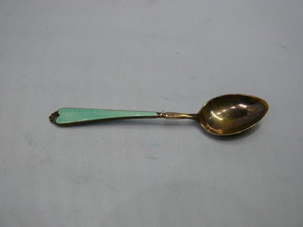 A cased set of six silver gilt and polychrome enamel coffee spoons, Birmingham 1960. Condition - Image 4 of 5