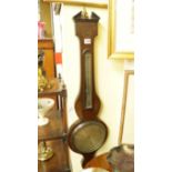 A 19th century mahogany and inlaid wheel