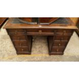 A 1920s oak pedestal desk, 105.5cm wide.