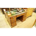 A late Victorian walnut pedestal desk, 1