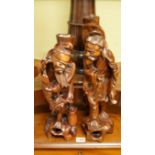 A pair of Japanese carved wood figural l