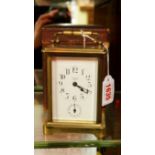An antique brass carriage clock, by Char