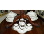 A continental porcelain cabaret set; together with a pair of continental porcelain tureens, covers