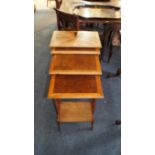 A nest of 19th century quartetto tables, each with specimen wood top, largest 50.5cm wide.