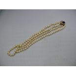 A pearl two strand necklace, having 9ct