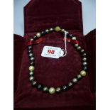 A Tahitian black pearl single strand necklace, having 9ct gold clasp, 39cm. Condition Report: Please