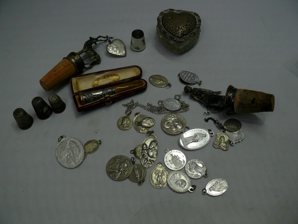 A silver mounted glass heart shaped jar;