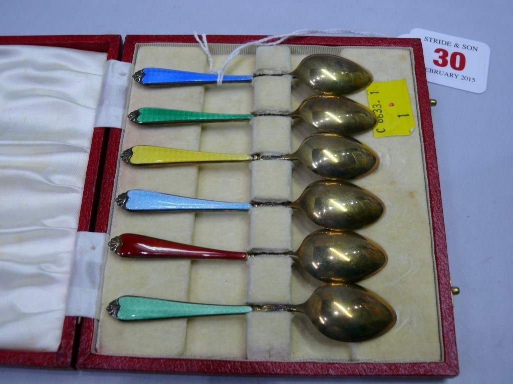 A cased set of six silver gilt and polychrome enamel coffee spoons, Birmingham 1960. Condition - Image 3 of 5