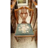 A George III fruitwood dining chair.