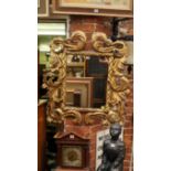 A 19th century carved giltwood framed wa