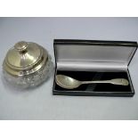 A cased silver spoon, by Haviland, 37g;