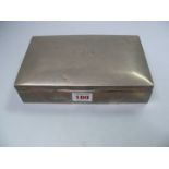 A silver rectangular cigarette box, Birmingham 1928, 21 x 12.5 x 4.5cm. Condition Report: engraved