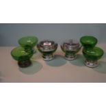 A set of six contemporary silver and green glass condiments, and matching silver gilt spoons, by