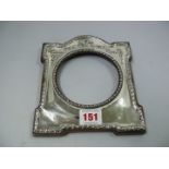 An Edwardian silver photograph frame, by