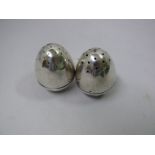 A pair of Victorian silver egg shaped pepperettes, by Sampson Mordan & Co, London 1880, engraved