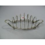 A silver oval toast rack, by Thomas Brad