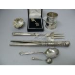 Two silver napkin rings, together with s