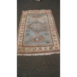 A modern geometric rug and a modern Bokhara.