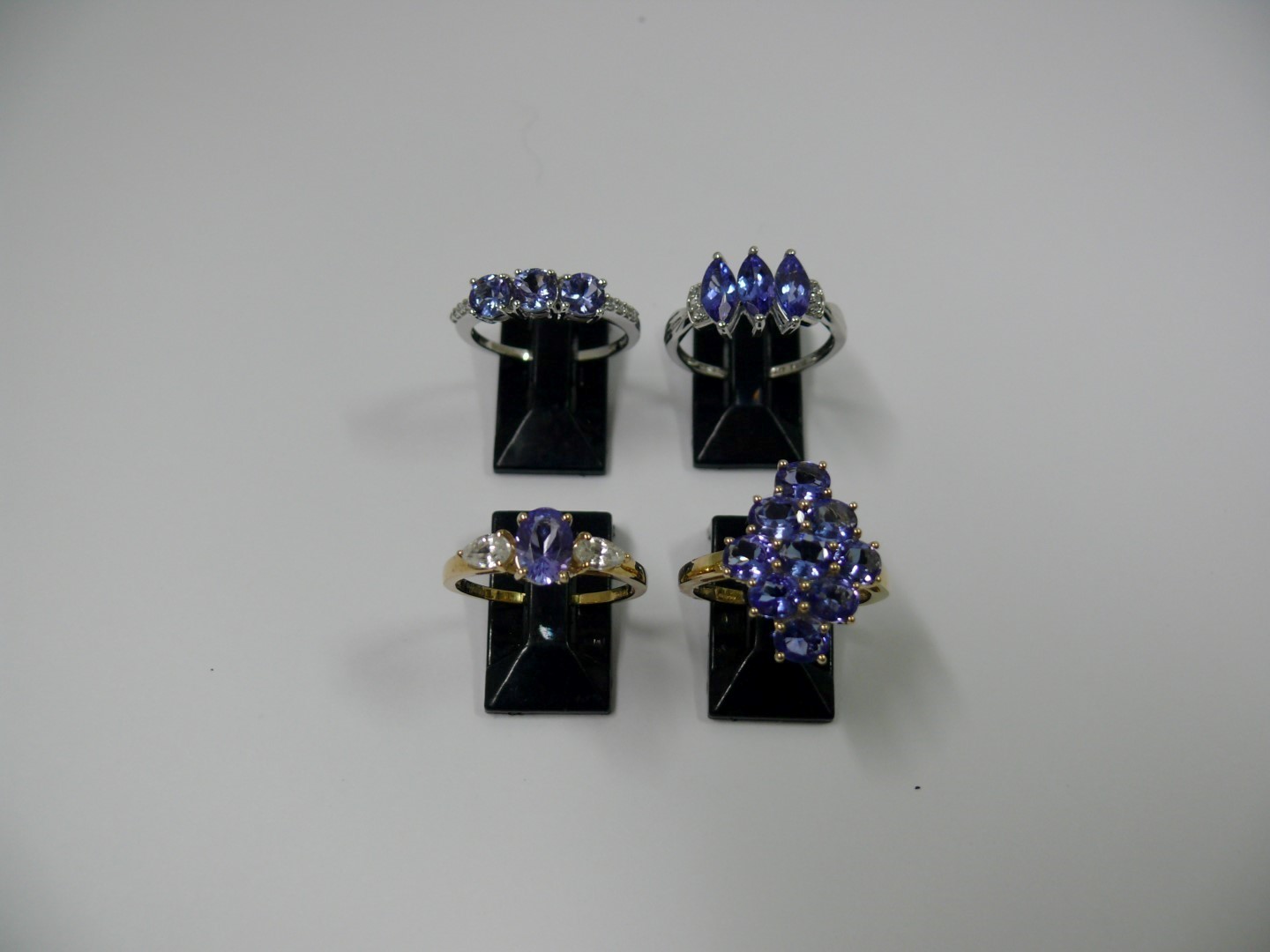 Two 10k yellow gold rings, set tanzanite