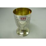 A George III silver footed goblet,  London 1811, having later engraved foliate decoration, 13cm,