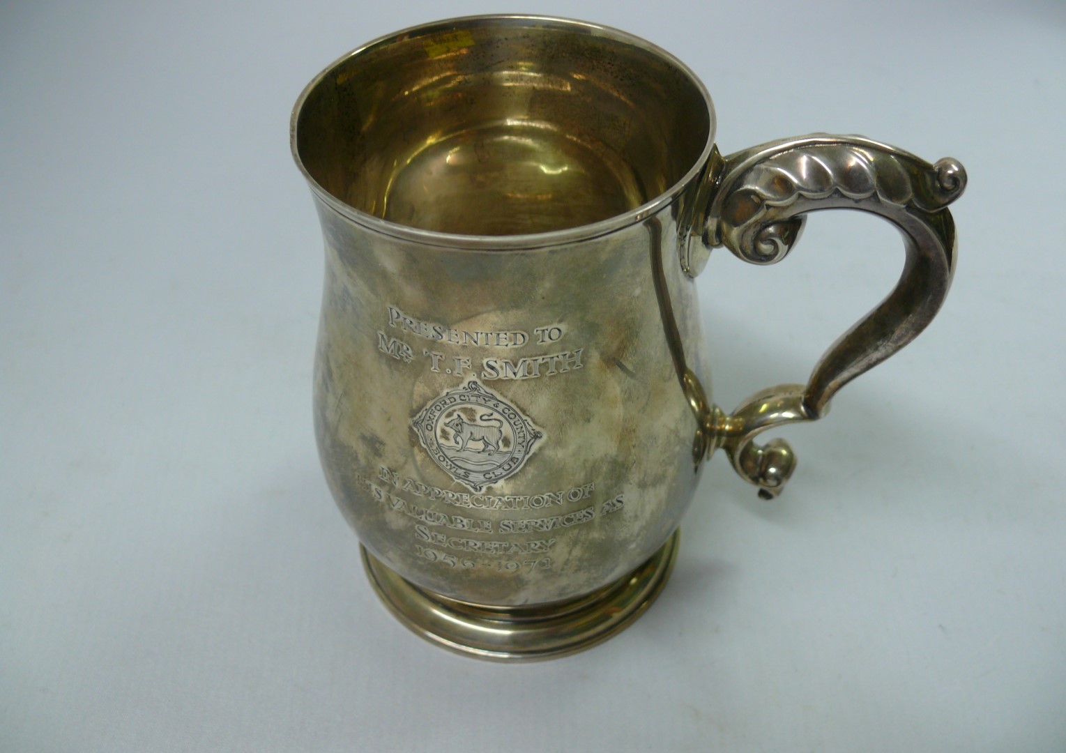 A silver baluster mug, by J B C & S Ltd, Birmingham, 11 cm, 321g Condition Report: Engraved Oxford