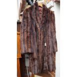 An old brown fur long coat, possibly min