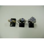 Two 14k white gold and tanzanite rings;