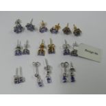 A collection of stud earrings set tanzan