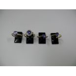 Four various 10k gold rings set tanzanit